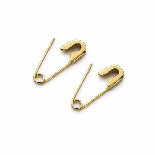 Pair of 5/8'' polished gold safety pin style mini earrings with rounded ends on white background .