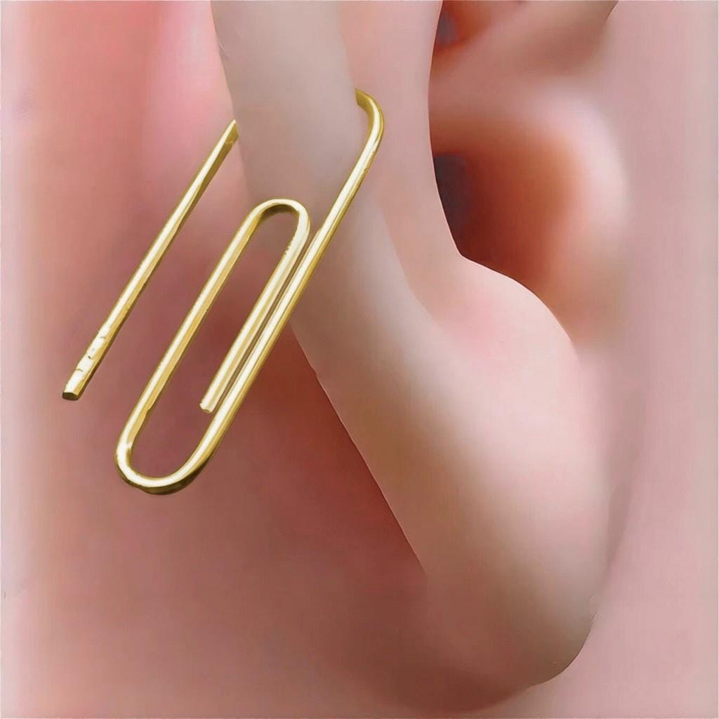 Gold PaperClip Earring 3/4 Inches worn on an ear - 24jewels