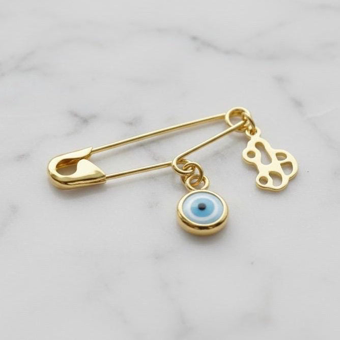 Gold Evil Eye Safety Pin Brooch With Car Charm On Marble Surface | Protection Baby Boy Gift - 24jewels