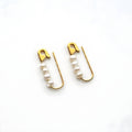 Gold safety pin hoop earrings with four white freshwater pearls each, edgy modern design .