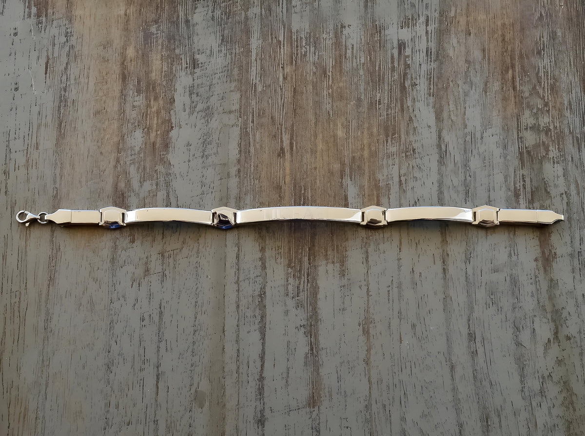 Personalized Silver Hebrew Bracelet which is on a wooden surface : Men’s Wrist Band Custom Bangle Jewish Jewelry - 24jewels