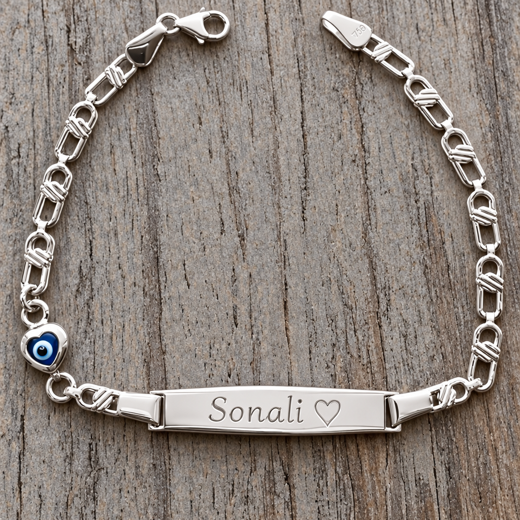 Personalized sterling silver baby bracelet with heart evil eye on wooden surface - 24jewels
