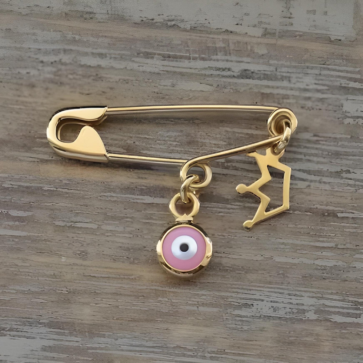 Sterling Silver Safety Pin Evil Eye Gold Plated Brooch With Crown on wooden background - 24jewels