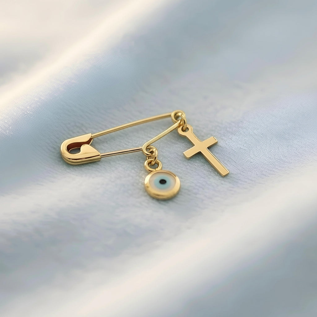 Gold Safety Pin Evil Eye Brooch with Cross on a soft blanket - 24jewels