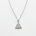 Sterling silver necklace with intricate Celtic Trinity knot pendant on delicate chain. on white background