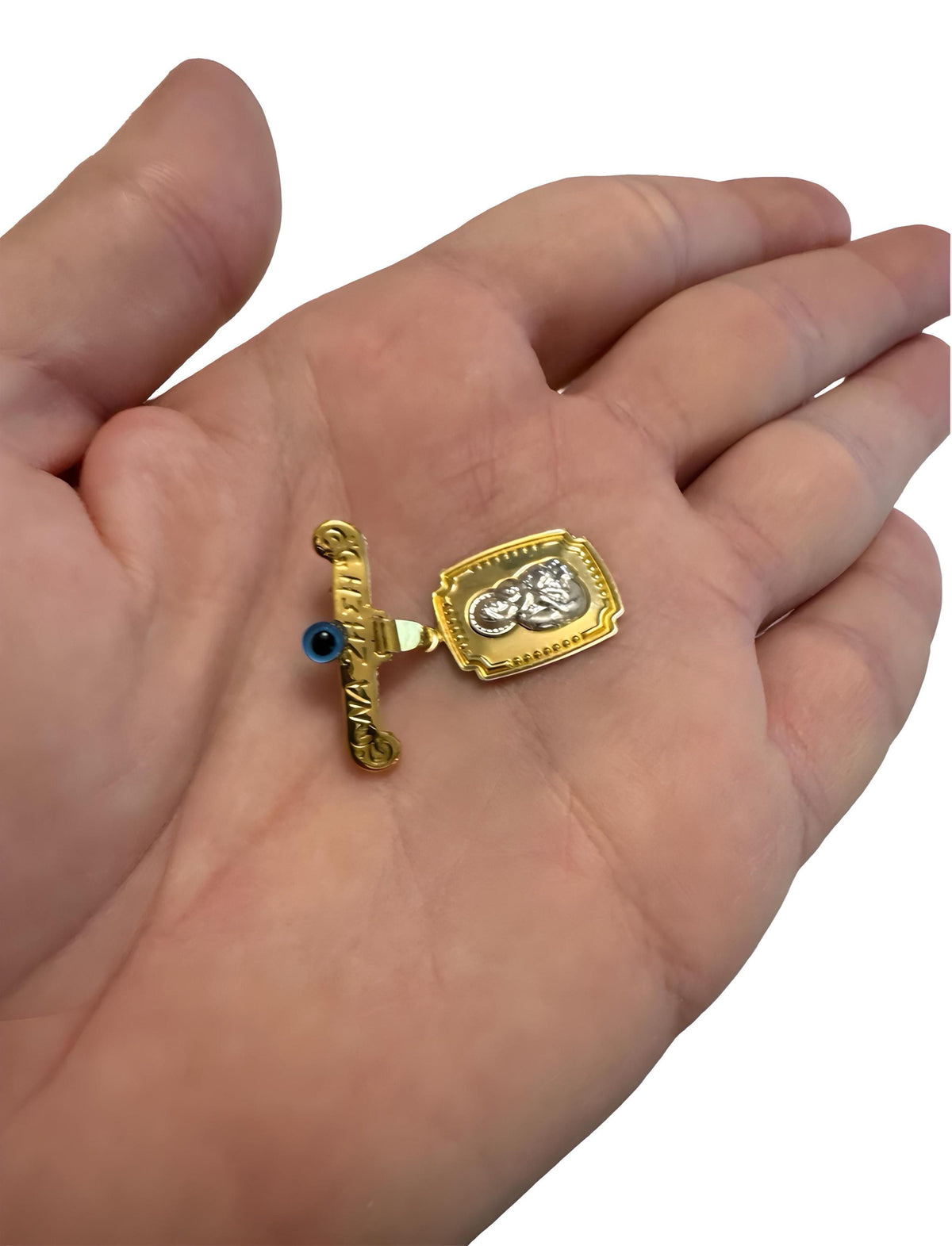 Sterling Silver Mary & Child Brooch: Evil Eye Baptism Pin two tone plated held in a hand - 24jewels