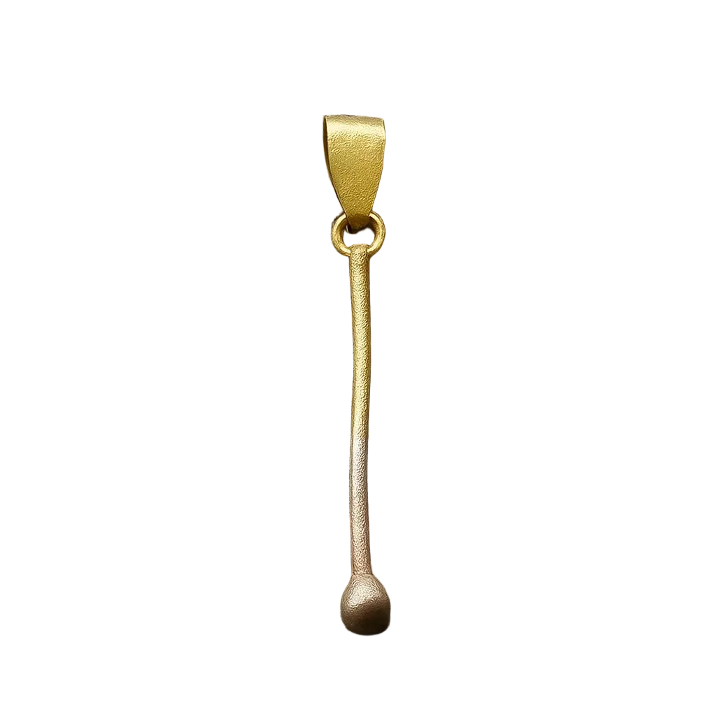 Gold plated silver pendant shaped like a slender matchstick with a smooth finish on white background .