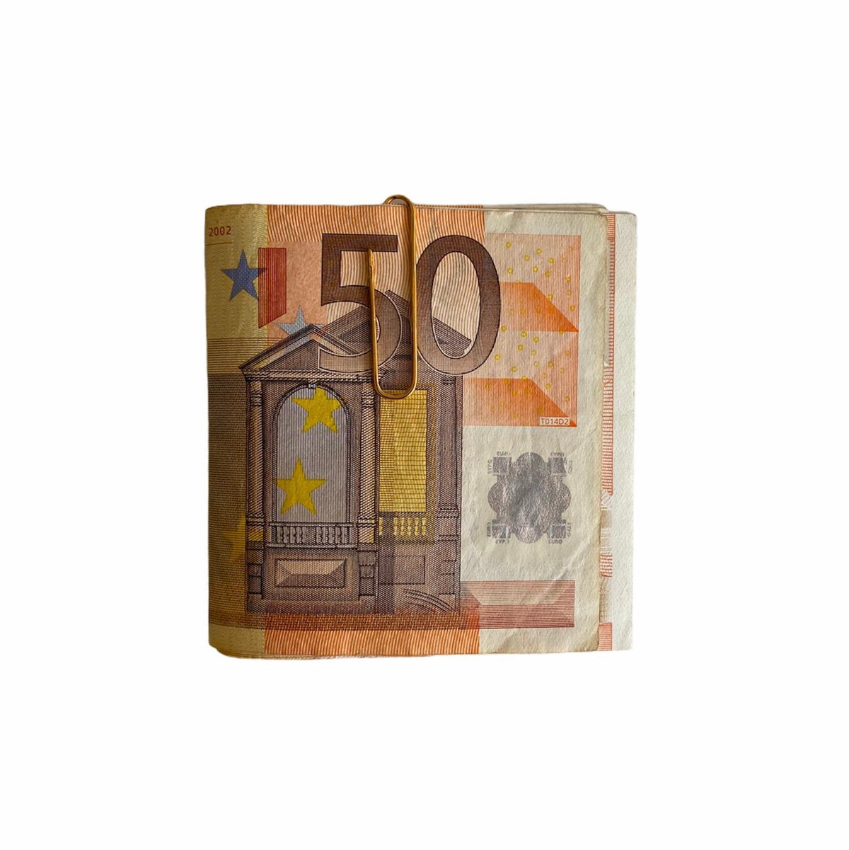Solid sterling silver shiny paperclip money clip holding folded euro banknotes.