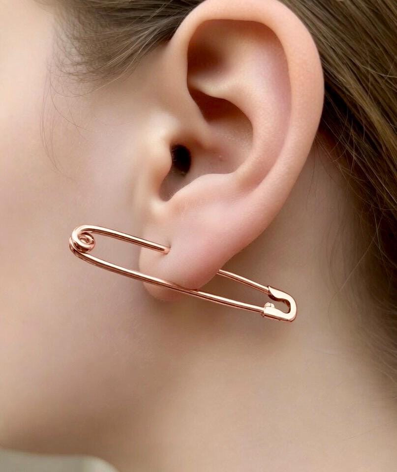 Sterling silver long safety pin earring rose gold plated , 1.75-inch, worn on earlobe.