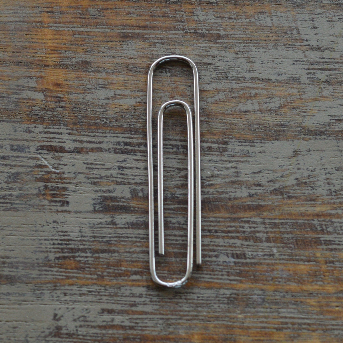 Gold Paper Clip Bookmark – 1.5” Minimalist Page Holder on wooden surface- 24jewels