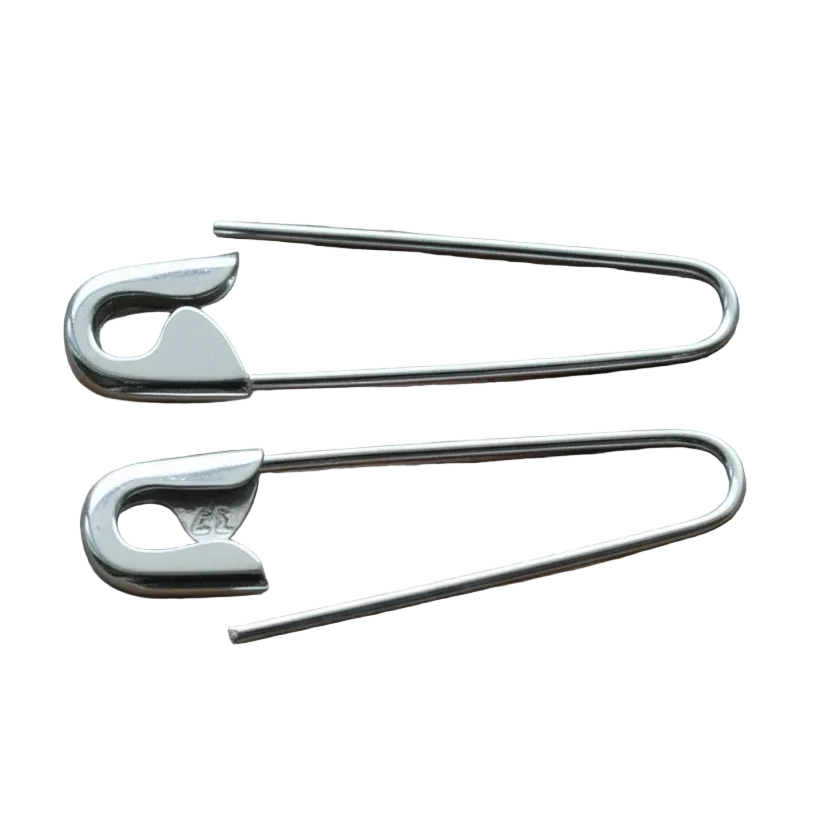 
white gold safety pin hoop earrings with a polished finish on white background , 1-inch length.