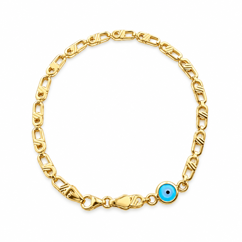 Delicate gold chain bracelet with a small blue and white evil eye charm and lobster clasp closure.
